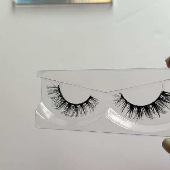 Video of Wispy Cat Eye False Eyelashes 25mm Strip Lashes The Looker by Labo Glam