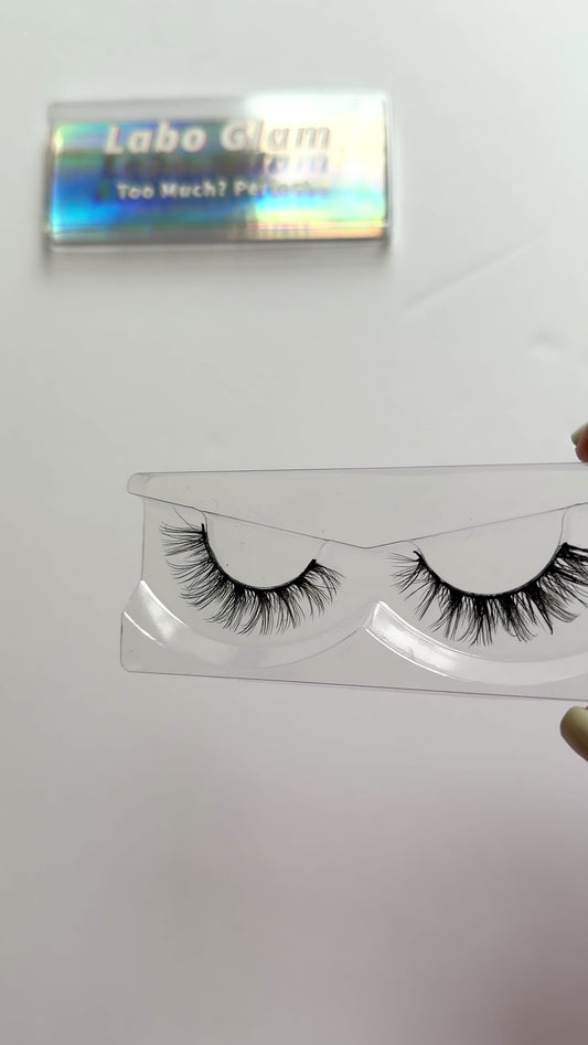 Video of Wispy Cat Eye False Eyelashes 25mm Strip Lashes The Looker by Labo Glam